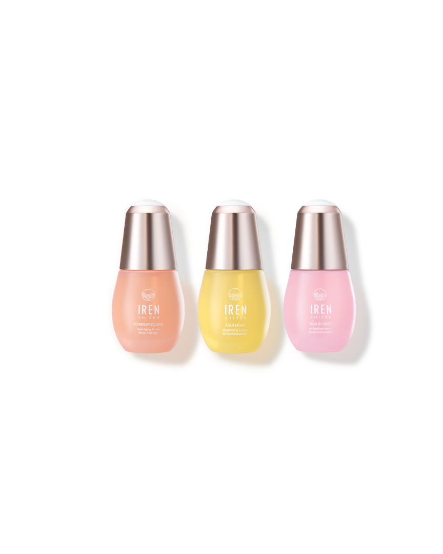 The 3-SERUM ROUTINE Custom Set by IREN Shizen features three colorful skincare serums with silver caps, displayed side by side on a white background.