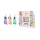 Three dropper bottles in blue, yellow, and green sit beside a boxed "FREE GIFT Discovery kit" by IREN Shizen, with matching bottle colors and pumpkin illustrations on the packaging.