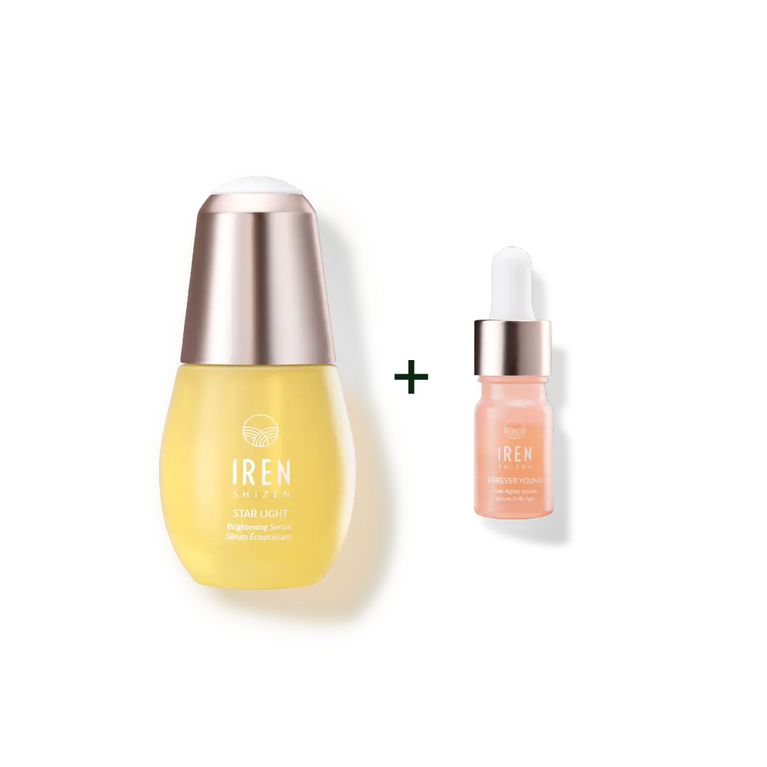 A yellow bottle of IREN Shizen STAR LIGHT Brightening Serum with a silver cap is shown beside a pink dropper bottle, plus sign in between—ideal for effective hyperpigmentation treatment.