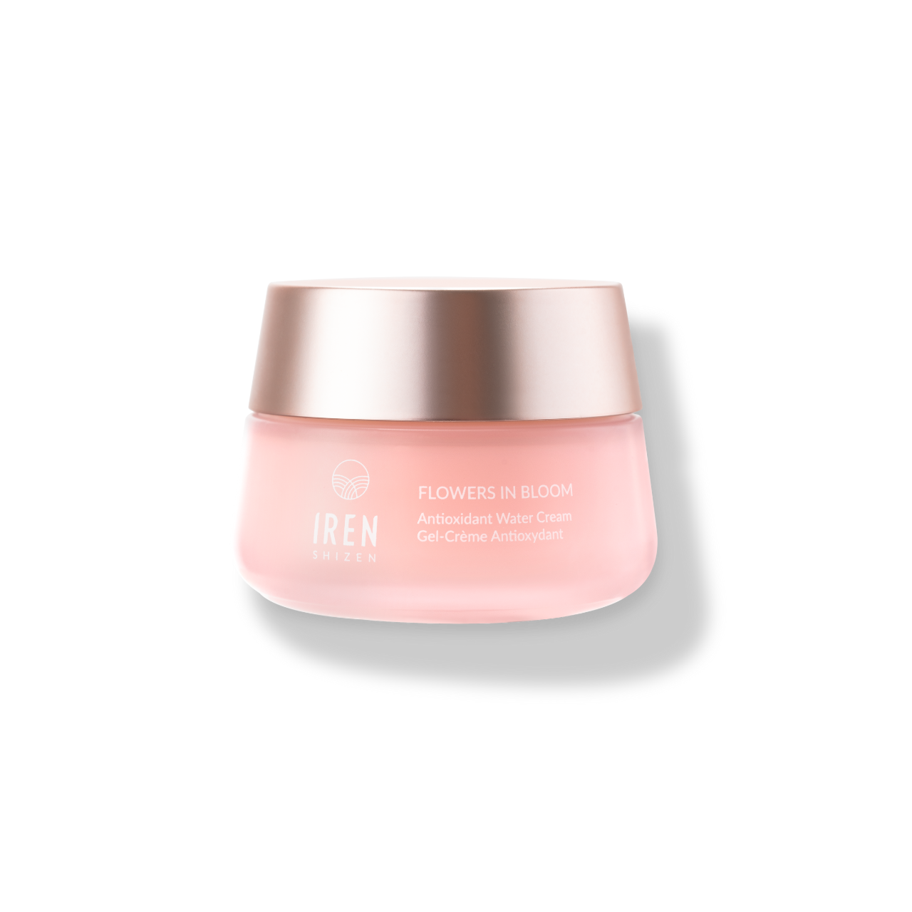 A pink cosmetic cream jar labeled "SAMPLE Moisturizers" by IREN Shizen, featuring a round rose-gold lid.