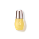 A bottle of Japanese skincare STAR LIGHT Brightening Serum by IREN Shizen on a black background.